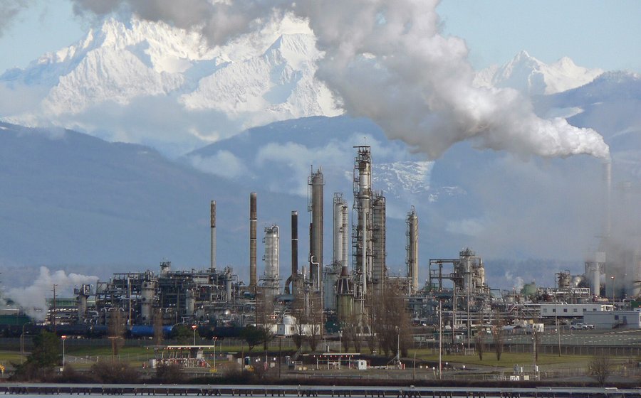 Oil refinery with processing towers